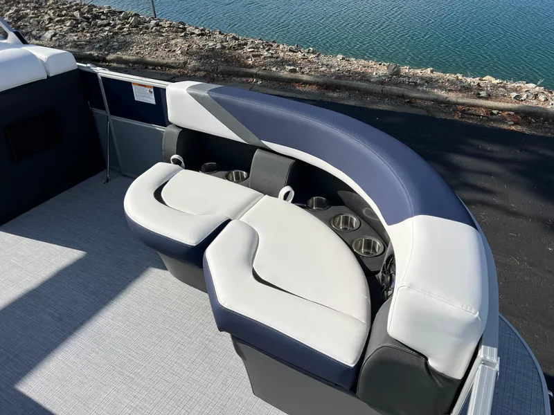 Slide: The Image of 2025 South Bay S 220CR2 pontoon boat with stylish seating and cup holders. - 9