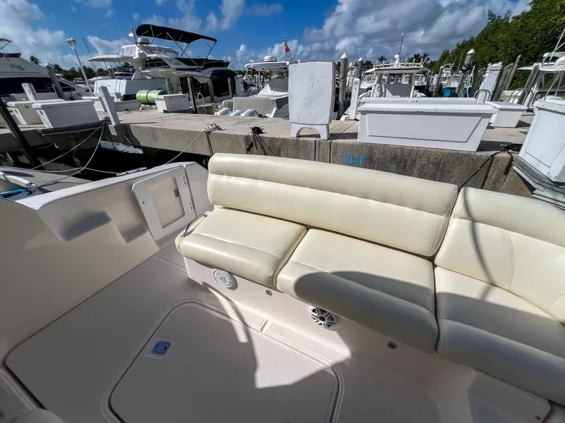 Slide: The Image of 2008 Tiara Yachts 3900 Sovran, docked with beige seating, sunny day. - 17
