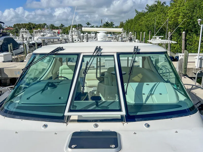 Slide: The Image of 2008 Tiara Yachts 3900 Sovran docked, showcasing sleek design and spacious interior. - 19