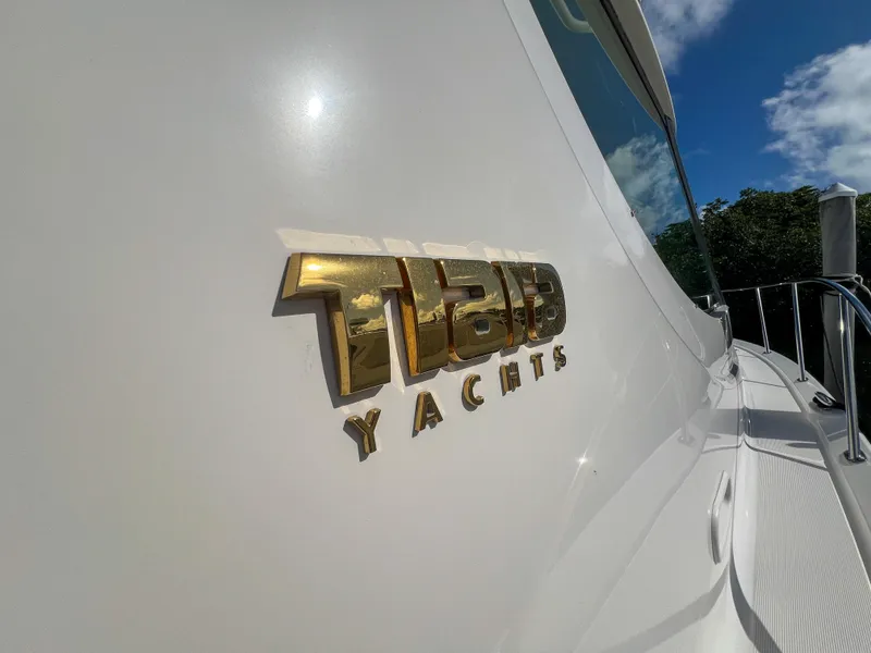 Slide: The Image of Close-up of 2008 Tiara Yachts 3900 Sovran logo on white hull. - 24