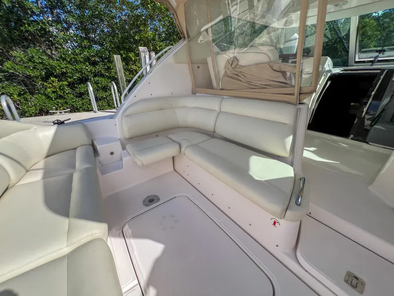 Slide: The Image of 2008 Tiara Yachts 3900 Sovran interior with white leather seating and spacious layout. - 25