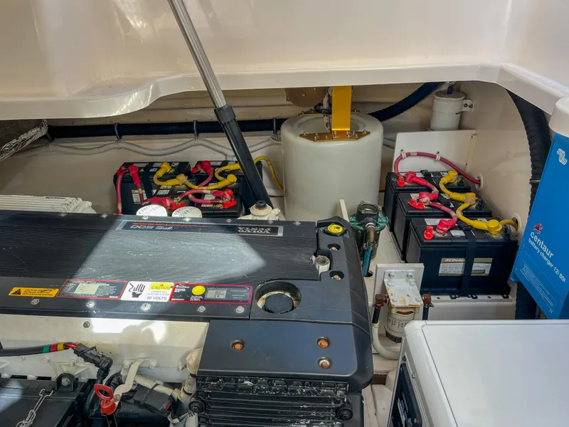 Slide: The Image of Engine compartment of 2008 Tiara Yachts 3900 Sovran with batteries and components. - 31
