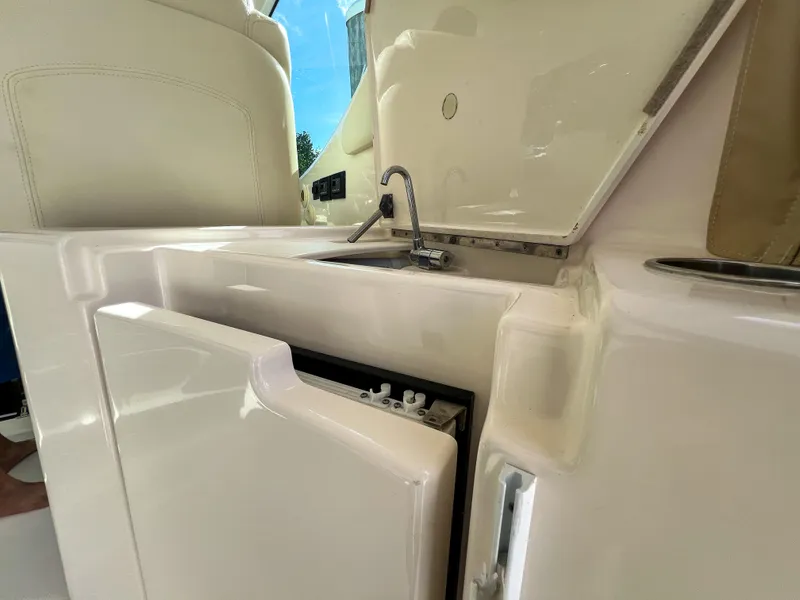 Slide: The Image of 2008 Tiara Yachts 3900 Sovran interior with sink and storage area. - 37