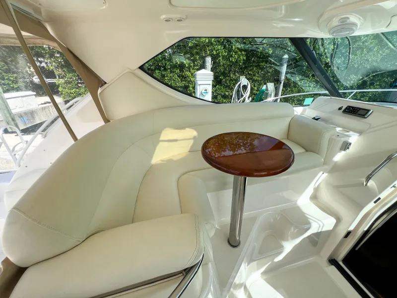 Slide: The Image of Luxurious interior of 2008 Tiara Yachts 3900 Sovran with elegant seating and table. - 44
