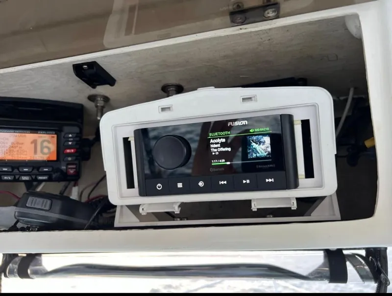 Slide: The Image of Fusion marine stereo and radio equipment on 2002 Seaswirl Striper 2601 Walkaround boat. - 11
