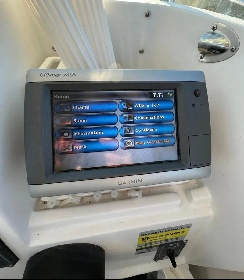 Slide: The Image of Garmin GPSmap 740s on 2002 Seaswirl Striper 2601 Walkaround boat dashboard. - 13