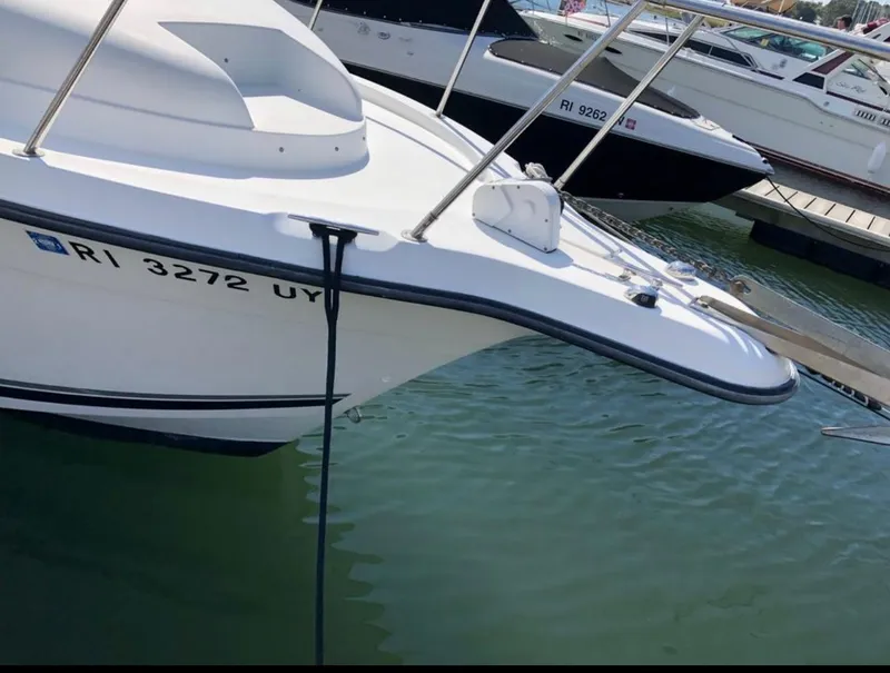 Slide: The Image of 2002 Seaswirl Striper 2601 Walkaround boat docked in marina. - 7