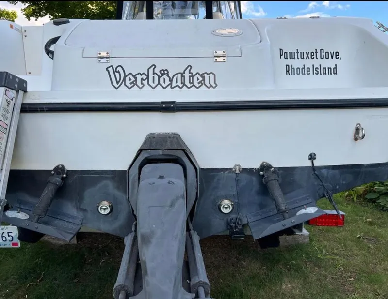 Slide: The Image of 2002 Seaswirl Striper 2601 Walkaround boat, named "Verböaten," in Pawtuxet Cove, Rhode Island. - 8