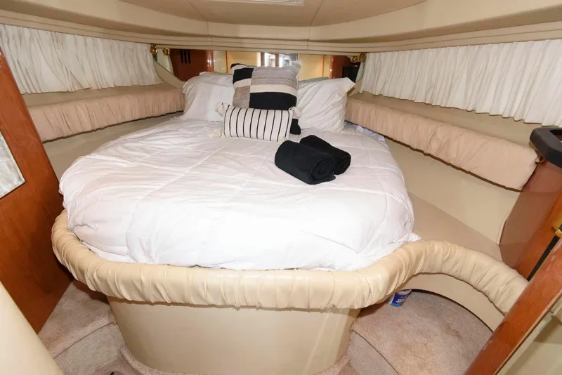 Slide: The Image of Luxurious cabin interior of 2000 Sea Ray 380 Sundancer yacht with cozy bed. - 19