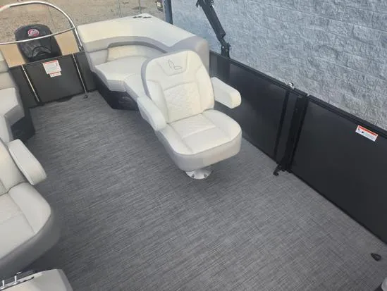 Slide: The Image of 2025 Lowe SS 230 WV boat interior with plush seating and modern design. - 7