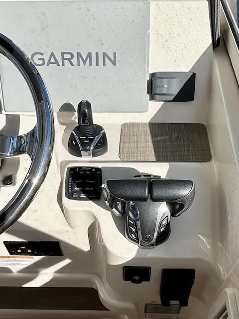 Slide: The Image of 2022 Grady-White Freedom 335 helm with Garmin navigation system. - 13