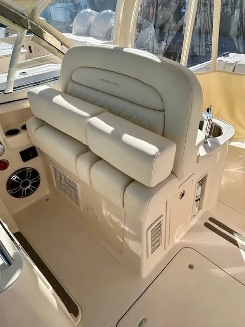 Slide: The Image of 2022 Grady-White Freedom 335 boat interior with luxurious seating and modern design. - 14