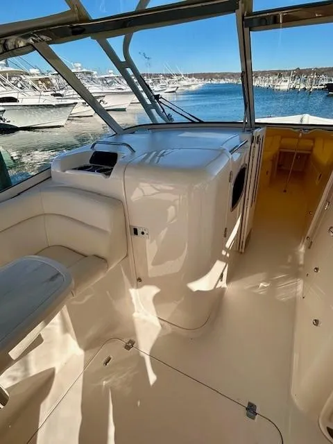 Slide: The Image of 2022 Grady-White Freedom 335 boat interior with harbor view. - 18