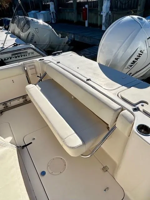 Slide: The Image of 2022 Grady-White Freedom 335 boat with Yamaha outboard engine and foldable seating. - 34