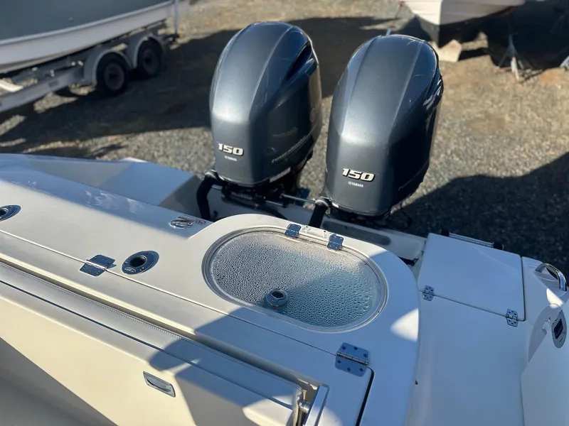 Slide: The Image of 2020 Cobia 262 Center Console with dual 150 horsepower engines. - 23