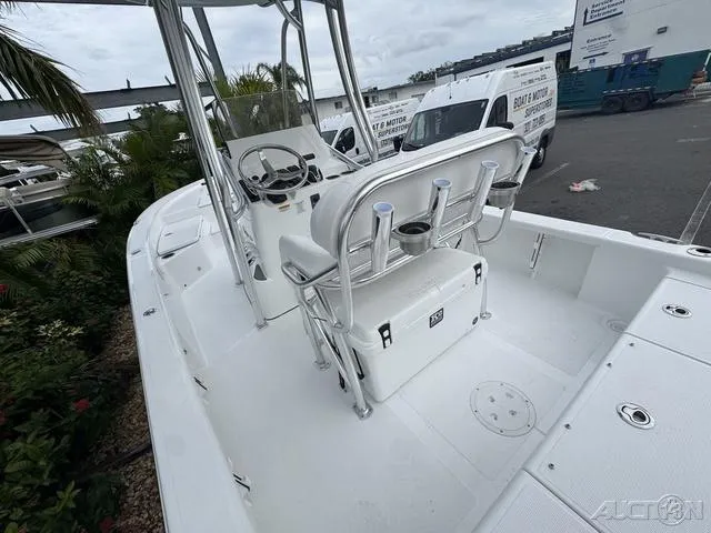 Slide: The Image of 2025 BlackJack 224 boat with sleek white deck and modern console design. - 15