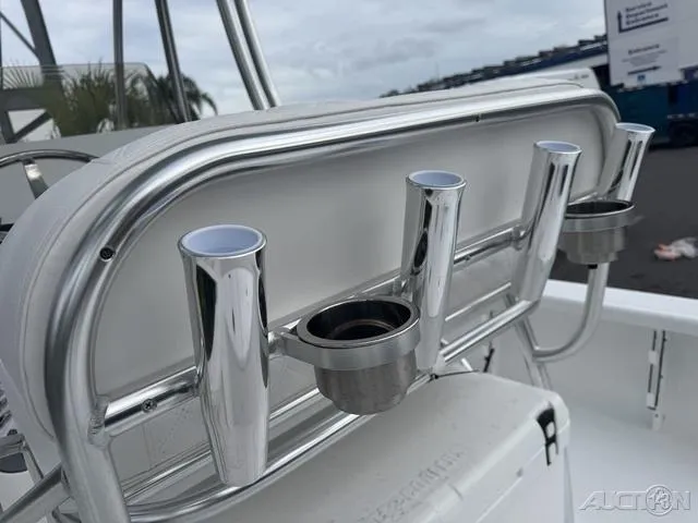 Slide: The Image of 2025 BlackJack 224 boat with stainless steel rod holders and cup holders. - 17