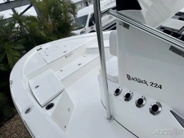 Slide: The Image of 2025 BlackJack 224 boat deck with sleek white design and modern features. - 23