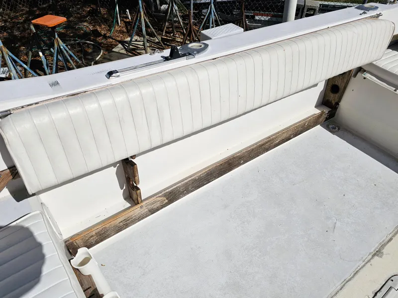 Slide: The Image of 1985 Grady-White 228 Seafarer boat interior with white seating and deck. - 25