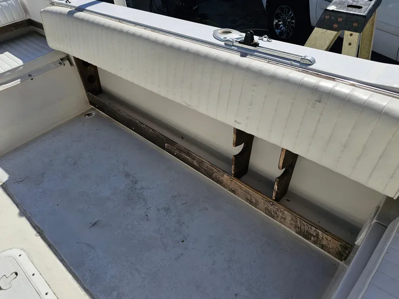 Slide: The Image of 1985 Grady-White 228 SEAFARER boat interior, showing seating and storage area. - 26