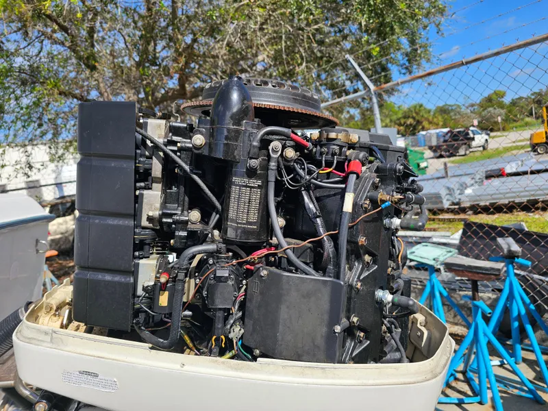 Slide: The Image of 1985 Grady-White 228 SEAFARER boat engine, detailed view, outdoors. - 36