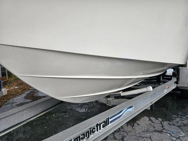 Slide: The Image of 1985 Grady-White 228 Seafarer boat hull on Magic Tilt trailer. - 7