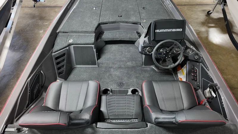 Slide: The Image of 2025 Skeeter ZXR 21 boat interior with dual seats and Humminbird navigation system. - 6
