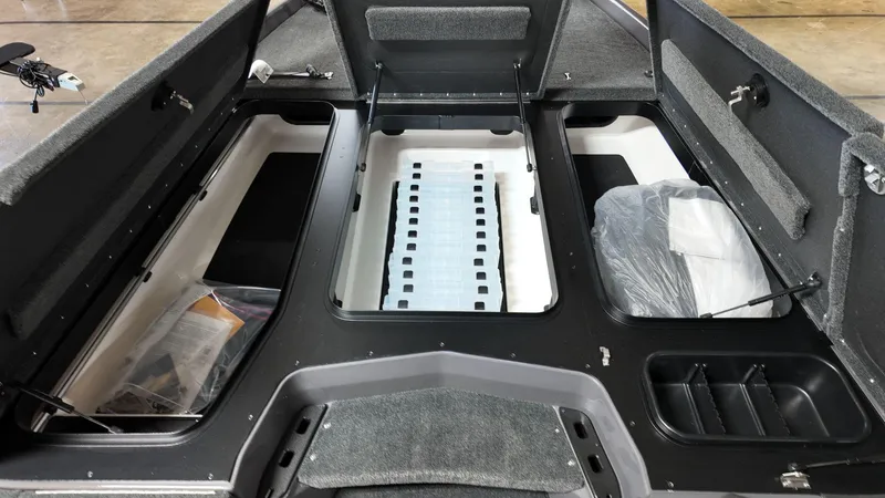 Slide: The Image of 2025 Skeeter ZXR 21 boat interior storage compartments and deck layout. - 9