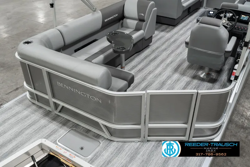 Slide: The Image of 2025 Bennington 22 SLSE pontoon boat interior with gray seating and flooring. - 11