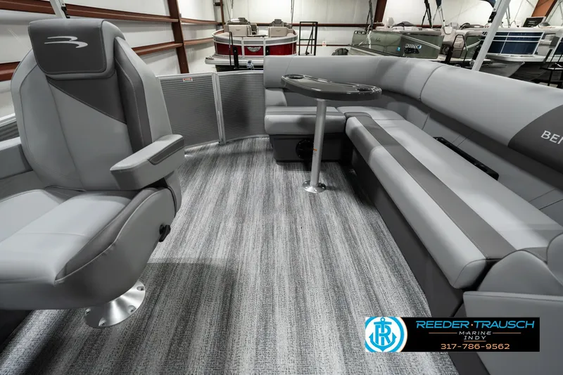 Slide: The Image of 2025 Bennington 22 SLSE pontoon boat interior with gray seating and carpet. - 15