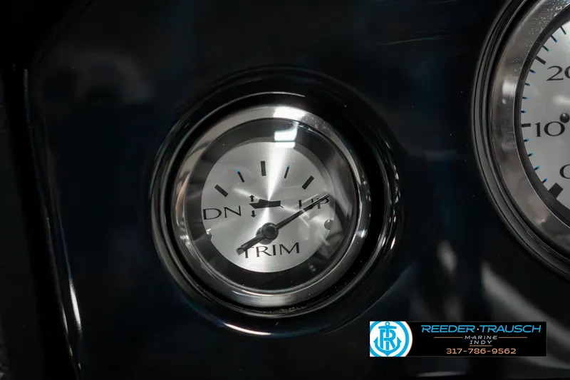 Slide: The Image of Close-up of 2025 Bennington 22 SLSE trim gauge on dashboard. - 32