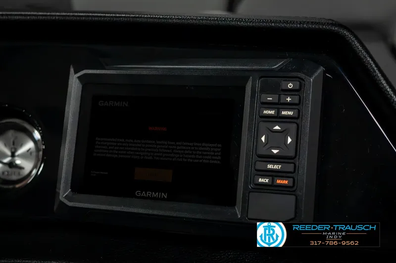 Slide: The Image of 2025 Bennington 22 SLSE dashboard with Garmin navigation system. - 35
