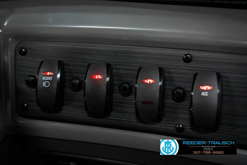 Slide: The Image of Control panel of 2025 Bennington 22 SLSE with illuminated switches. - 36