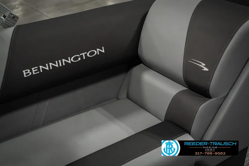 Slide: The Image of 2025 Bennington 22 SLSE boat seat with logo, featuring sleek black and gray design. - 38