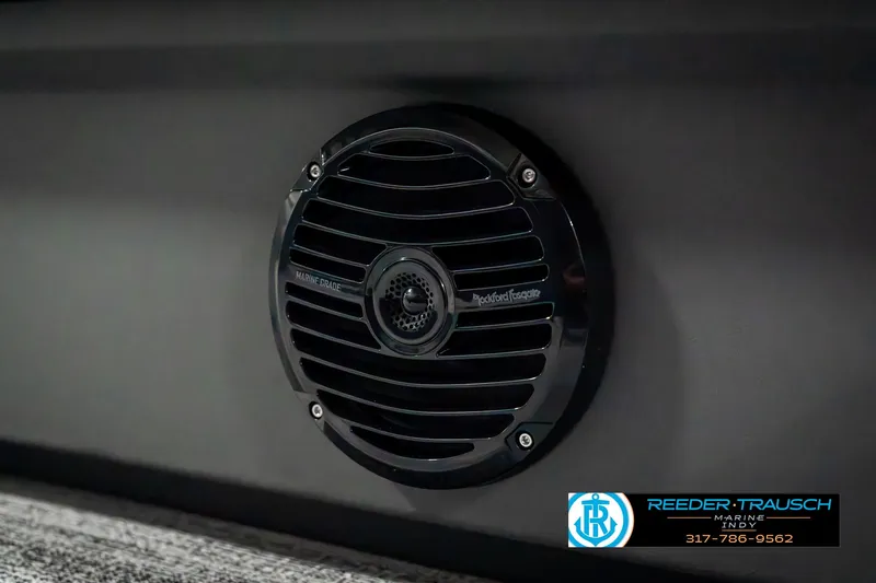 Slide: The Image of 2025 Bennington 22 SLSE boat speaker detail, Reeder-Trausch Marine branding. - 44