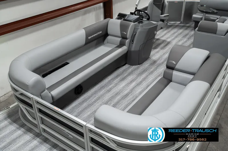 Slide: The Image of 2025 Bennington 22 SLSE pontoon boat interior with gray seating and modern design. - 9