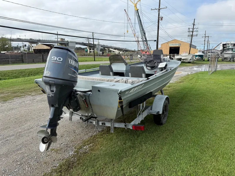 Slide: The Image of 2012 Alweld 1960VVSC Bay boat with Yamaha 90 HP engine on trailer. - 3
