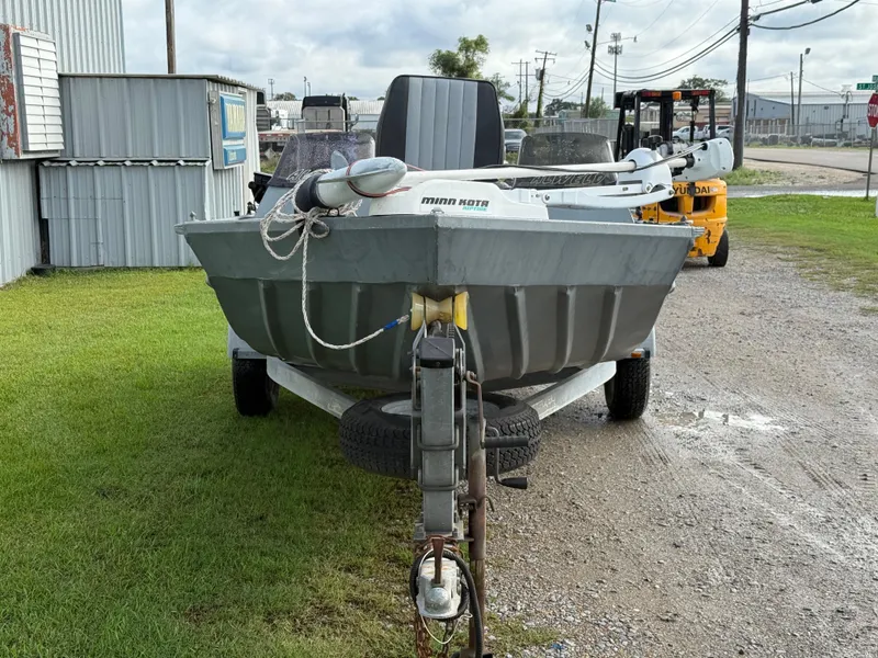 Slide: The Image of 2012 Alweld 1960VVSC Bay boat on trailer, parked outdoors. - 5
