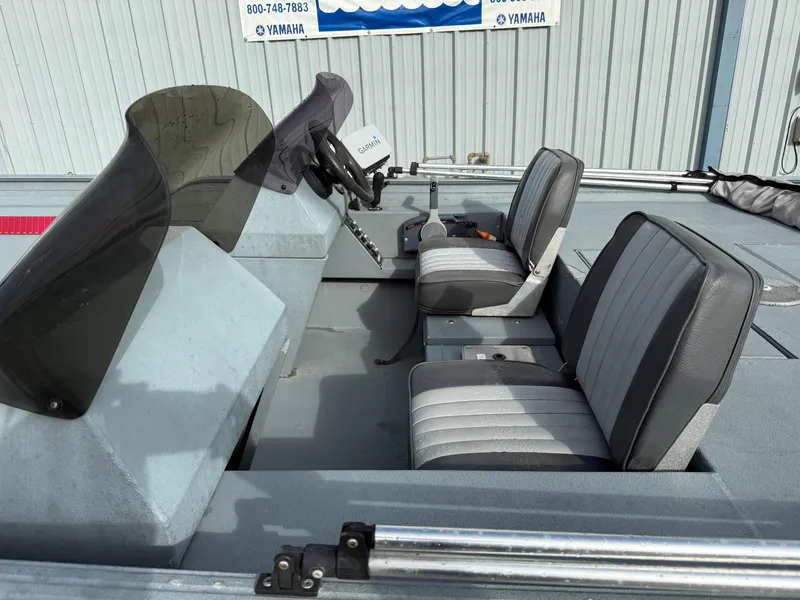 Slide: The Image of 2012 Alweld 1960VVSC Bay boat interior with dual seats and steering console. - 8