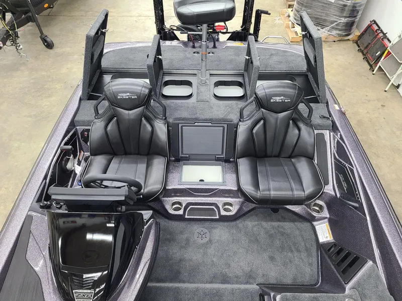 Slide: The Image of 2024 Skeeter ZXR 20 boat interior with dual seats and modern dashboard. - 10