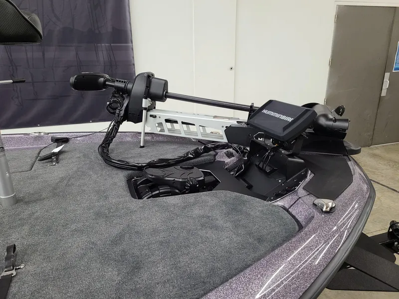 Slide: The Image of 2024 Skeeter ZXR 20 boat with advanced trolling motor and sleek design. - 2