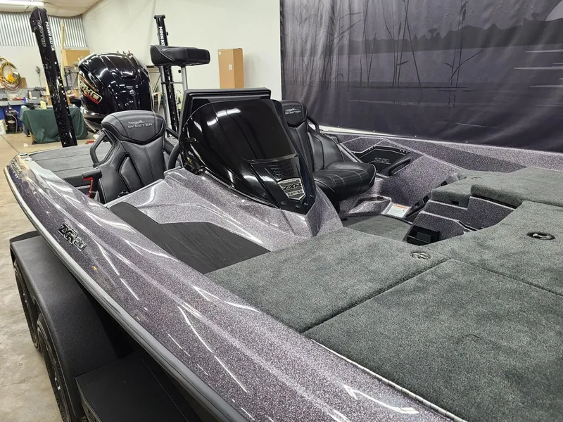 Slide: The Image of 2024 Skeeter ZXR 20 bass boat with sleek design and spacious interior. - 4