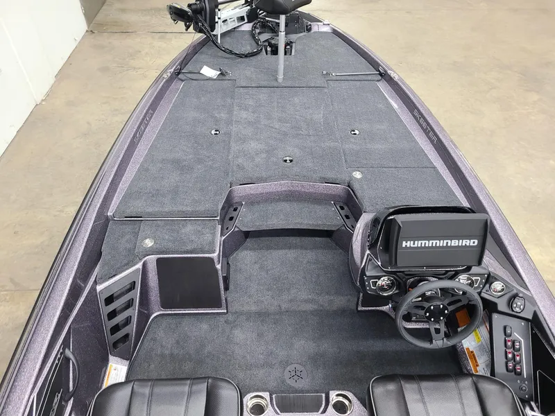 Slide: The Image of 2024 Skeeter ZXR 20 boat interior with Humminbird electronics and spacious deck. - 7