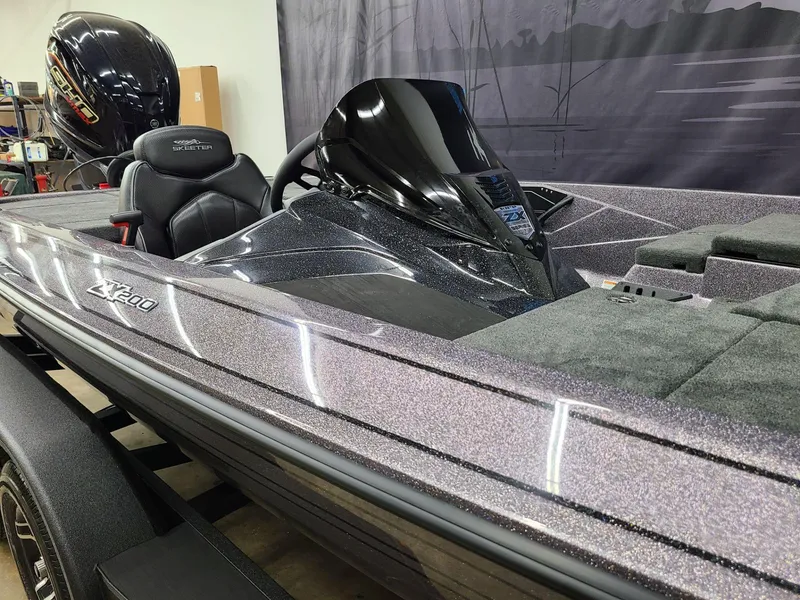 Slide: The Image of 2024 Skeeter ZX 200 bass boat with sleek design and modern features. - 4