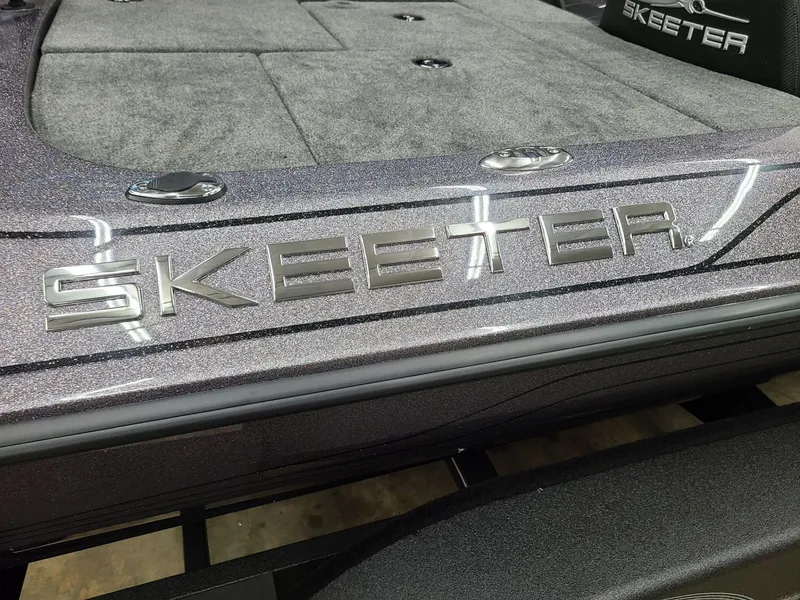 Slide: The Image of 2024 Skeeter ZX 200 boat deck with sleek design and branding. - 5
