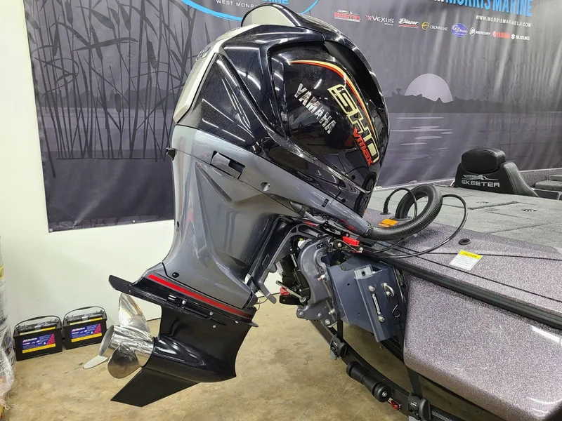 Slide: The Image of 2024 Skeeter ZX 200 boat with Yamaha outboard motor in showroom. - 6