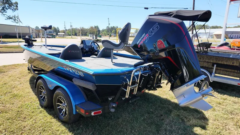 Slide: The Image of 2023 Vexus AVX2080 boat with powerful outboard motor on a trailer. - 3