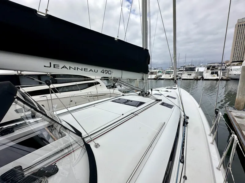 Slide: The Image of Jeanneau Sun Odyssey 490 sailboat docked at marina, 2020 model. - 30