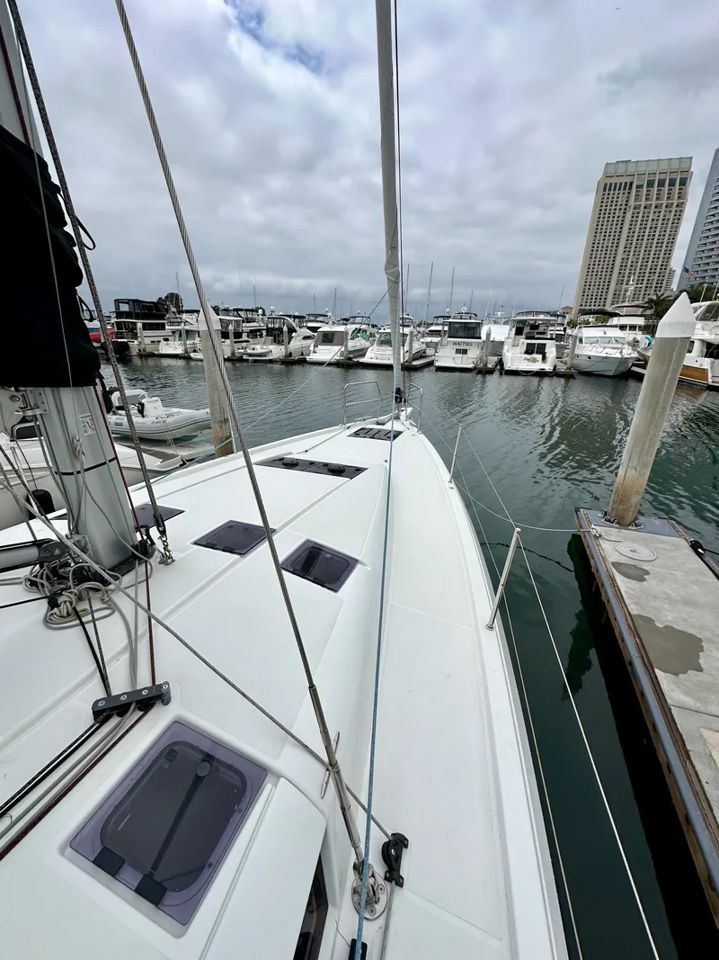 Slide: The Image of Jeanneau Sun Odyssey 490 sailboat docked in marina, 2020 model. - 31