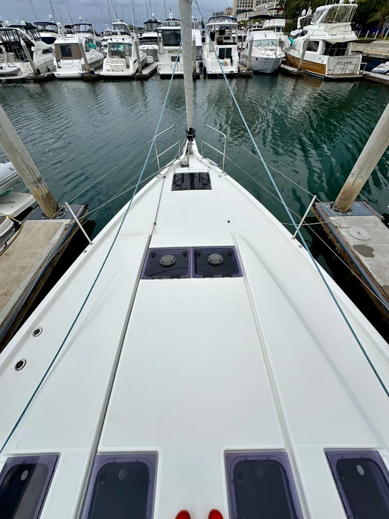 Slide: The Image of Jeanneau Sun Odyssey 490 sailboat docked at marina, 2020 model. - 33